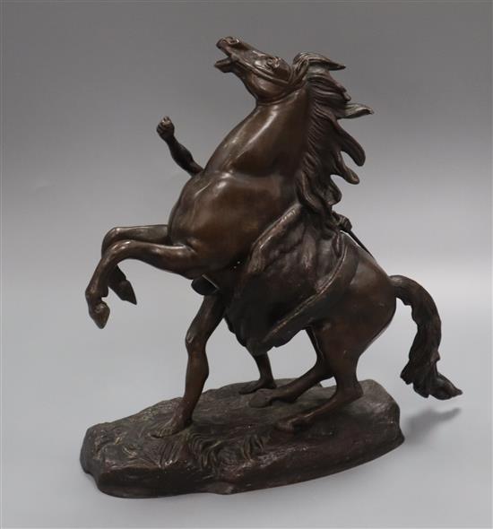 A bronze Marley model, signed height 31cm